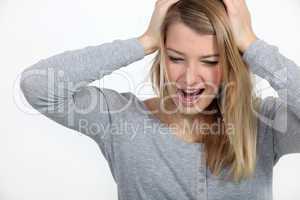 Stressed blond woman shouting