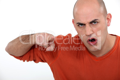 Angry man pointing his finger