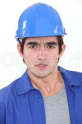 Concerned construction worker