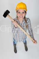 Tradeswoman holding a mallet