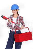 Woman with a toolbox and wrench