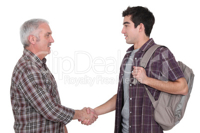 Two casual men shaking hands