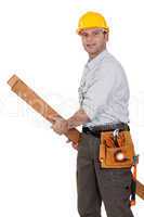 Tradesman carrying planks of wood