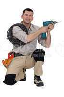 Handyman holding a power tool