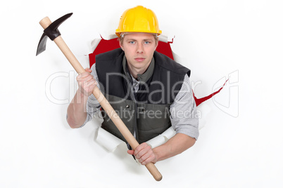 A threatening man with a pickaxe.
