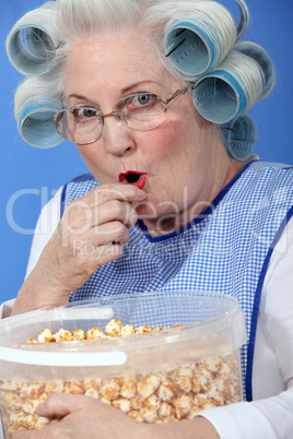Granny eating caramel popcorn