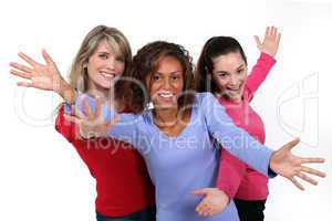 Three happy young woman