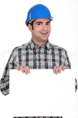Builder with a board left blank for your message