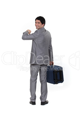 Businessman looking at the time