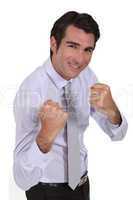 smiling businessman ready for fight