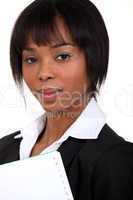 gorgeous black woman holding notebook with thumb index