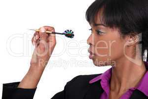 black beauty playing darts