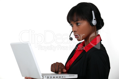 An African American businesswoman at work.