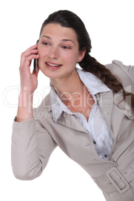 Cute businesswoman on the phone