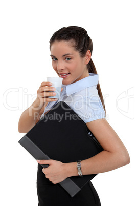 secretary drinking coffee