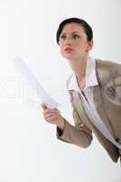 Serious businesswoman with a document
