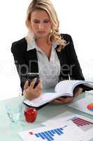 Blond woman reading through important documents