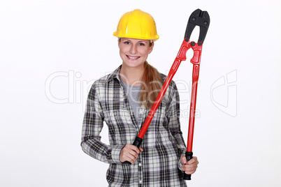 Woman holding large bolt-cutters