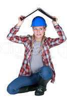 Tradeswoman covering her head