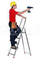 A handyman with a drill.