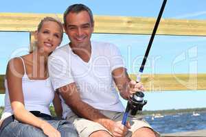 couple doing sea fishing