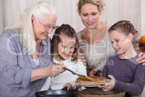 Three generations enjoying crepes