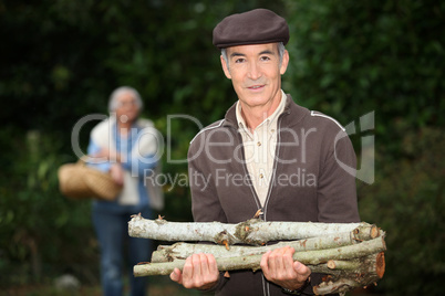 Man collecting wood