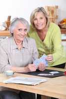 Older women playing cards