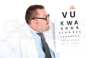 Optician holding up an eyechart