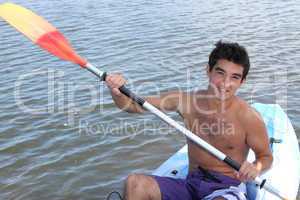 Young lad kayaking