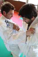 Men practicing judo