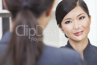 Asian Chinese Woman or Businesswoman in Meeting