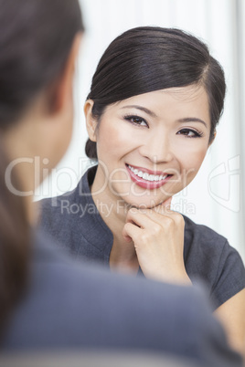 Asian Chinese Woman or Businesswoman in Meeting