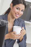 Woman Businesswoman Drinking Coffee in Office