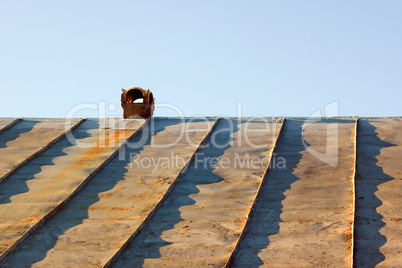 Chimney on an obsolete tinny roof