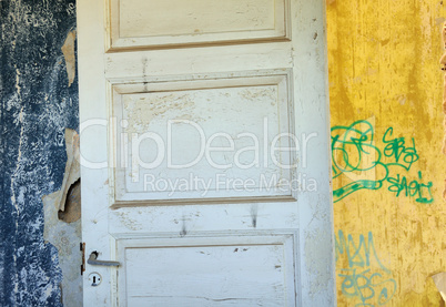 wooden door wallpaper shreds peeling wall