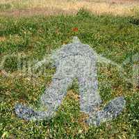 human figure imprinted on grass