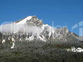 Mountain Peak And Forest In The Autumn