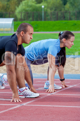 Man and woman on the starting line