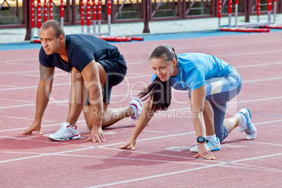 Man and woman on the starting line