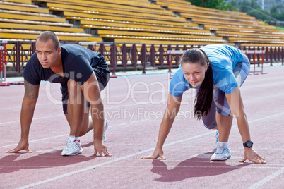 Man and woman on the starting line