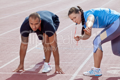 Man and woman at the stadium