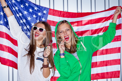 Beautiful patriotic girls with lollipop