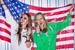 Beautiful patriotic girls with lollipop