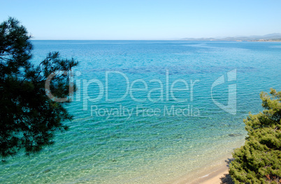 Beach and turquoise water of Aegean Sea, Halkidiki, Greece