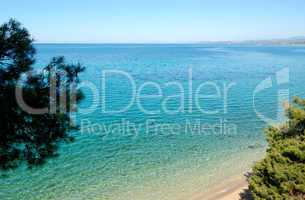 Beach and turquoise water of Aegean Sea, Halkidiki, Greece