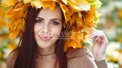 Attractive Woman in Autumn Wreath