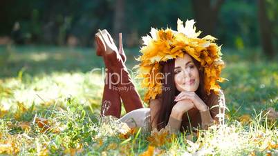 Smiling Attractive Woman in Autumn Wreath
