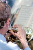 Musician plays the trumpet