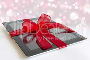 Digital tablet with christmas present